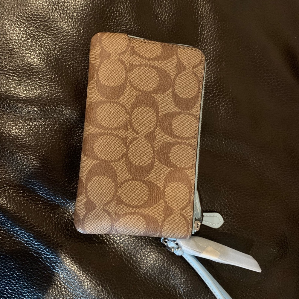 Brand new never used. Coach Wristlet